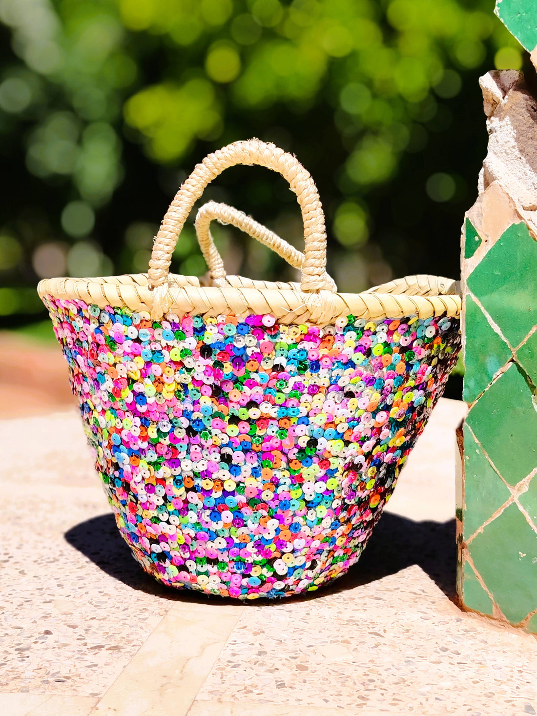 Handwoven straw tote with vibrant multicolor sequins. Ethically made, eco-friendly, and perfect for beach days, festivals, gifting, or bold summer style.