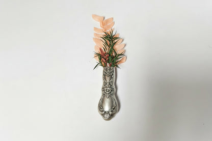 Antique silverware magnetic bud vase that sticks to fridges and metal surfaces. Holds water, one-of-a-kind vintage gift decor.
