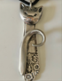 Handmade silver sassy cat pendant necklaces from vintage silverware. Elegant, whimsical, and adjustable on a satin cord. Sustainably crafted and one-of-a-kind.