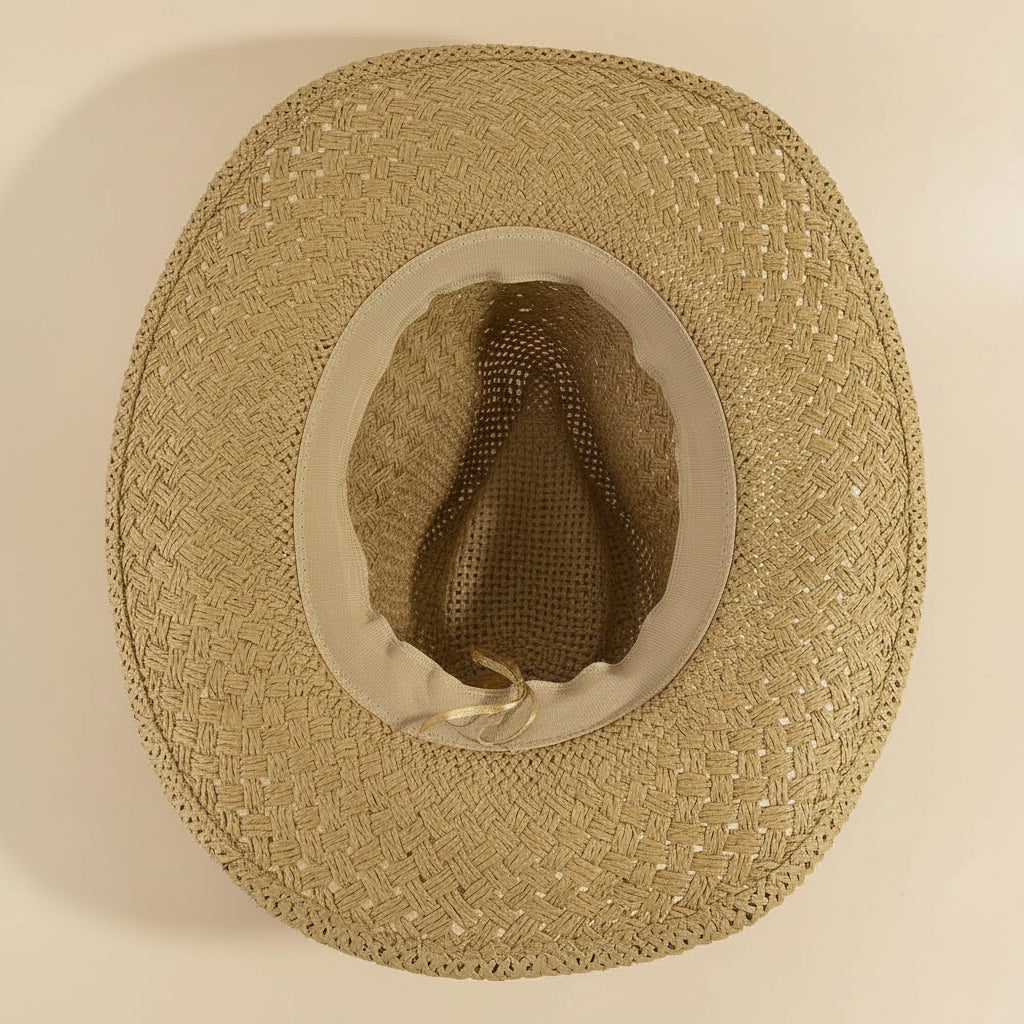 Cowrie Shell Band Cowboy Hat featuring woven paper straw texture and coastal boho western style. Lightweight, breathable, and perfect for beach days or festivals.