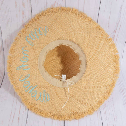 Woven raffia sun hat featuring lightweight breathable texture and timeless summer style. Perfect for beach days, vacations, casual outfits, and warm-weat