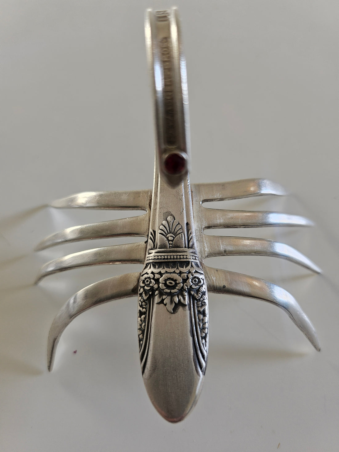 Handcrafted from vintage silverware, these salvaged scorpion and turtle sculptures bring charm, symbolism, and eco-friendly artistry to any space
