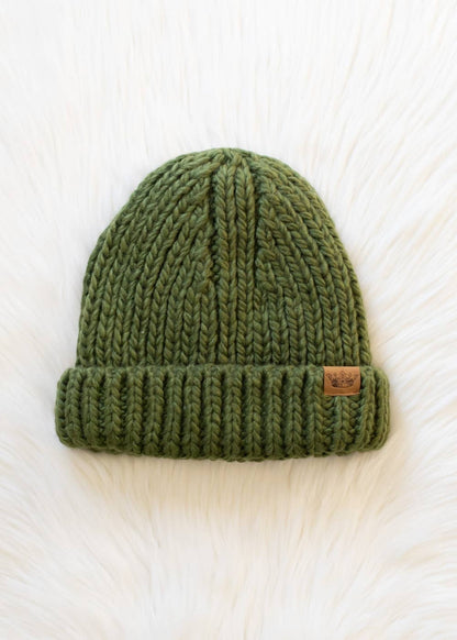Olive chunky knit cuffed beanie with cozy fleece lining. Made from 100% acrylic, this classic winter hat adds warmth and earthy style to chilly days.