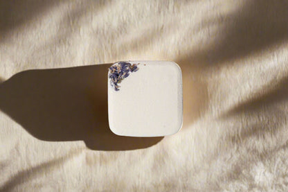 2oz handmade botanical bath bomb. Biodegradable wrap, rich oils, fizzy soak. Skin-softening, aromatic, and perfect for gifting or daily self-care rituals.