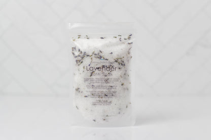 Handcrafted 5 oz botanical bath salts in heat-sealed pouches. Plant-based, aromatic blends with essential oils &amp; florals for a calming, skin-softening soak.