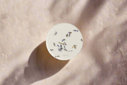 Aromatherapy shower steamer with essential oils. Biodegradable, handmade, and ultra-scented for a spa-like experience. Not for use as a bath bomb.