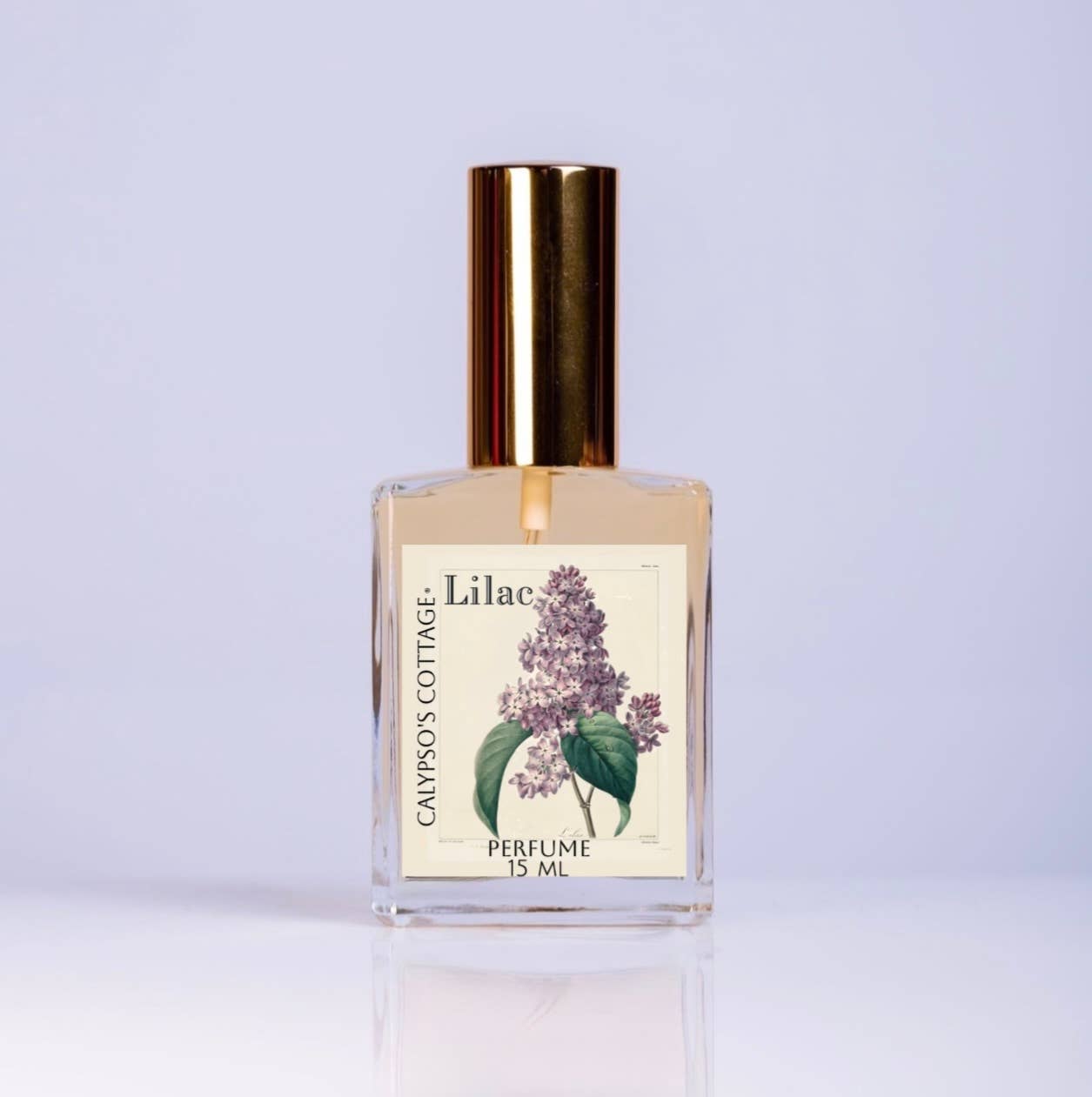 Romantic Lilac Perfume Oil with notes of neroli, lilac, gardenia, and musk. A clean, vegan fragrance handcrafted with organic jojoba and almond oils.