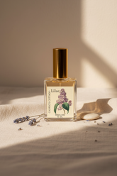 Romantic Lilac Perfume Oil with notes of neroli, lilac, gardenia, and musk. A clean, vegan fragrance handcrafted with organic jojoba and almond oils.