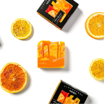 Main Squeeze Soap—juicy orange &amp;amp; lemon scent with bright citrus swirls and glittery waves. Energizing, uplifting, and handcrafted with organic oils &amp;amp; shea butter.