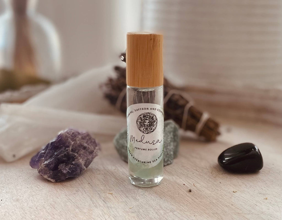 Unleash your inner goddess with Medusa Perfume Roller—jasmine, saffron, and cedarwood infused with aventurine and sea shells for oceanic allure.