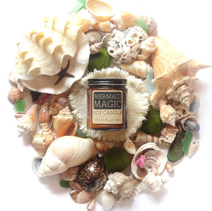 Mystical Mermaid: A sea salt &amp; driftwood scented soy candle in a 9oz amber jar. Beachy, ocean-inspired, hand-poured in Austin for 50+ hours of magic.
