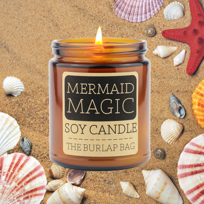 Mystical Mermaid: A sea salt &amp; driftwood scented soy candle in a 9oz amber jar. Beachy, ocean-inspired, hand-poured in Austin for 50+ hours of magic.