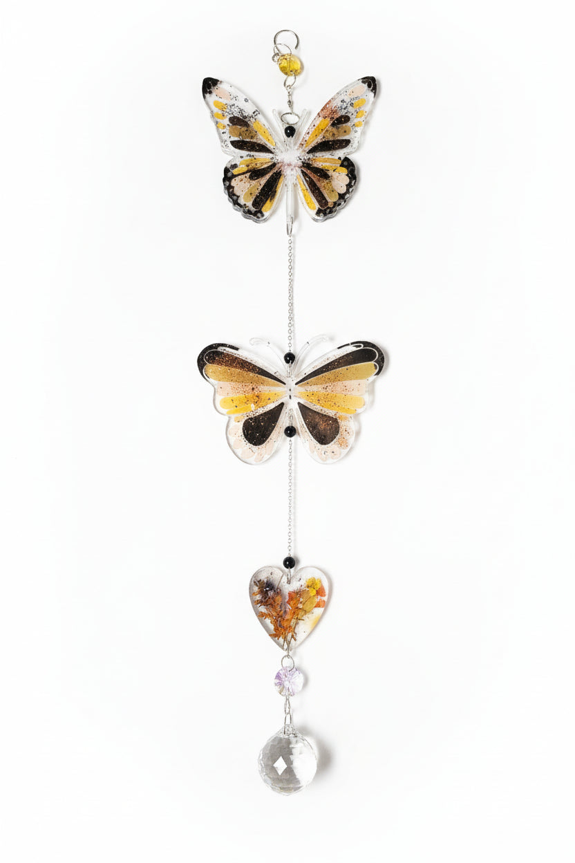 Handmade butterfly suncatchers with real pressed flowers and crystal chain. Reflects sunlight into rainbows—perfect for windows or near plants.