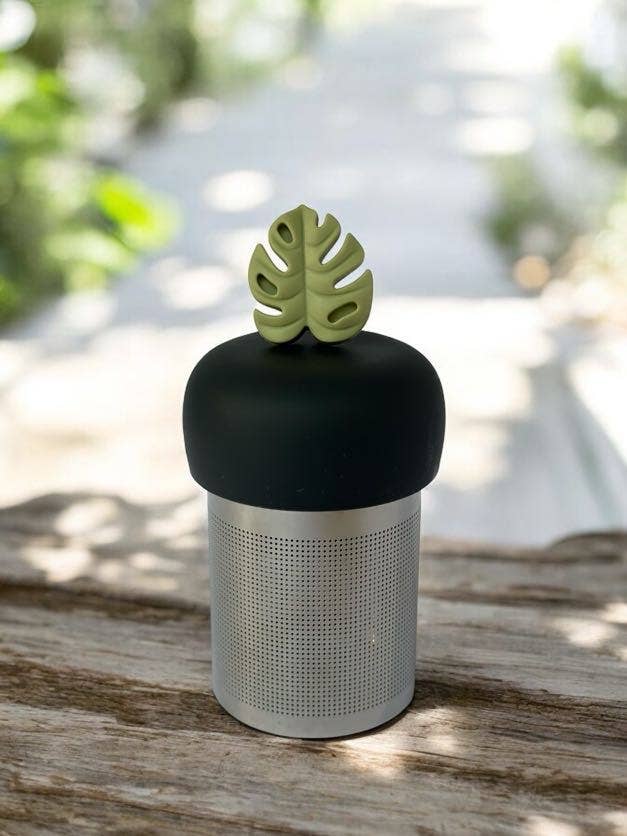 Monstera Leaf Tea Steeper makes loose-leaf tea easy and stylish. Reusable, portable, and dishwasher-safe with stainless mesh for clean, debris-free sipping.