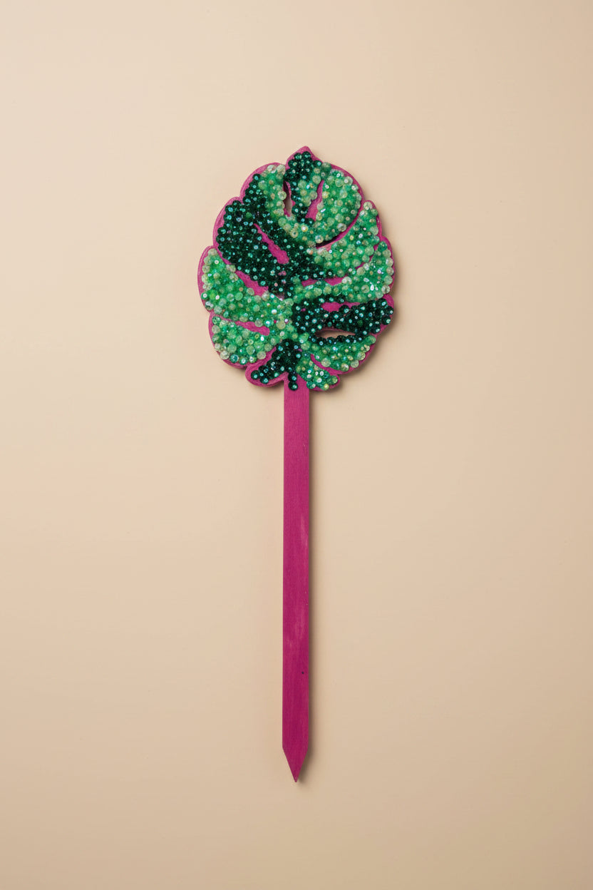 Bedazzled Monstera wooden plant stakes, hand-painted with sparkling details. Choose Monstera, Albo, Aurea or Thai Constellation for unique plant décor.