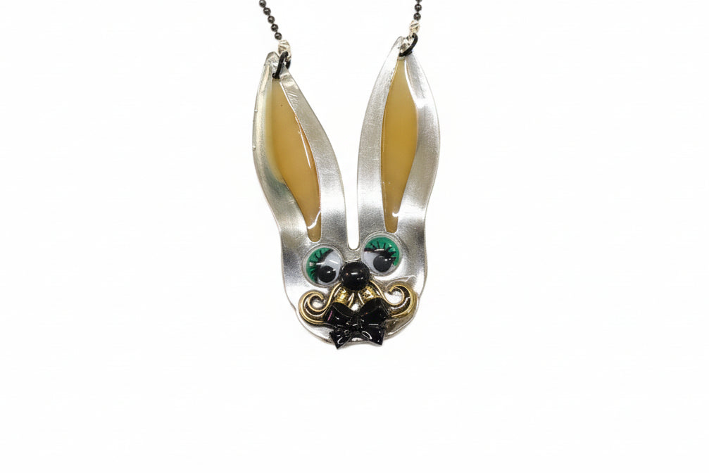 Whimsical fancy bunny pendant necklace handcrafted from vintage silverware, resin, and beads. One-of-a-kind Easter or everyday jewelry with vintage charm.