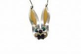 Whimsical fancy bunny pendant necklace handcrafted from vintage silverware, resin, and beads. One-of-a-kind Easter or everyday jewelry with vintage charm.