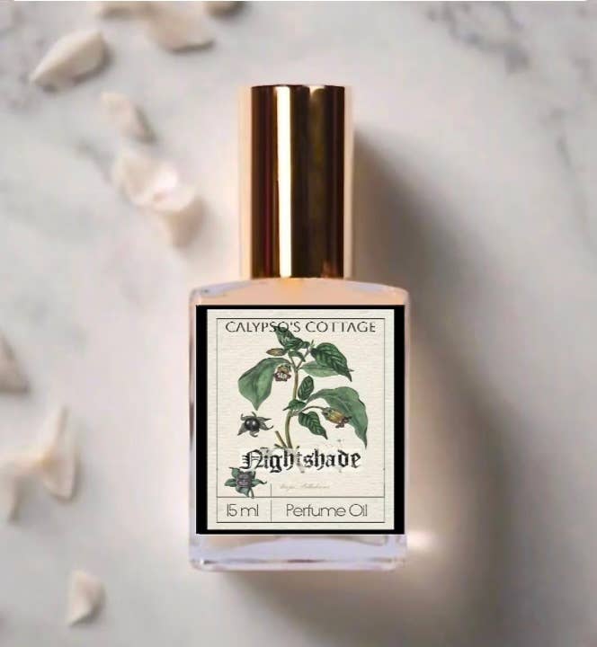 Nightshade Perfume Oil blends dark berries, moonlit florals, herbal greens, vanilla and haunted woods into a mysterious, sensual poison garden fragrance.