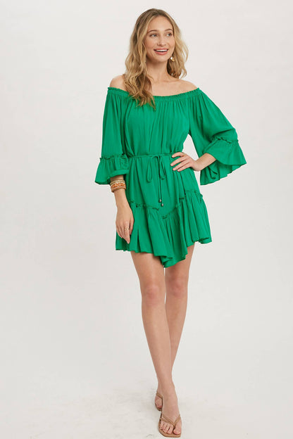 Romantic off-shoulder dress with ruffled sleeves, frilled hem, and a swingy silhouette. Adjustable belt adds shape to this breezy, flounce favorite.