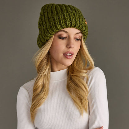 Olive chunky knit cuffed beanie with cozy fleece lining. Made from 100% acrylic, this classic winter hat adds warmth and earthy style to chilly days.