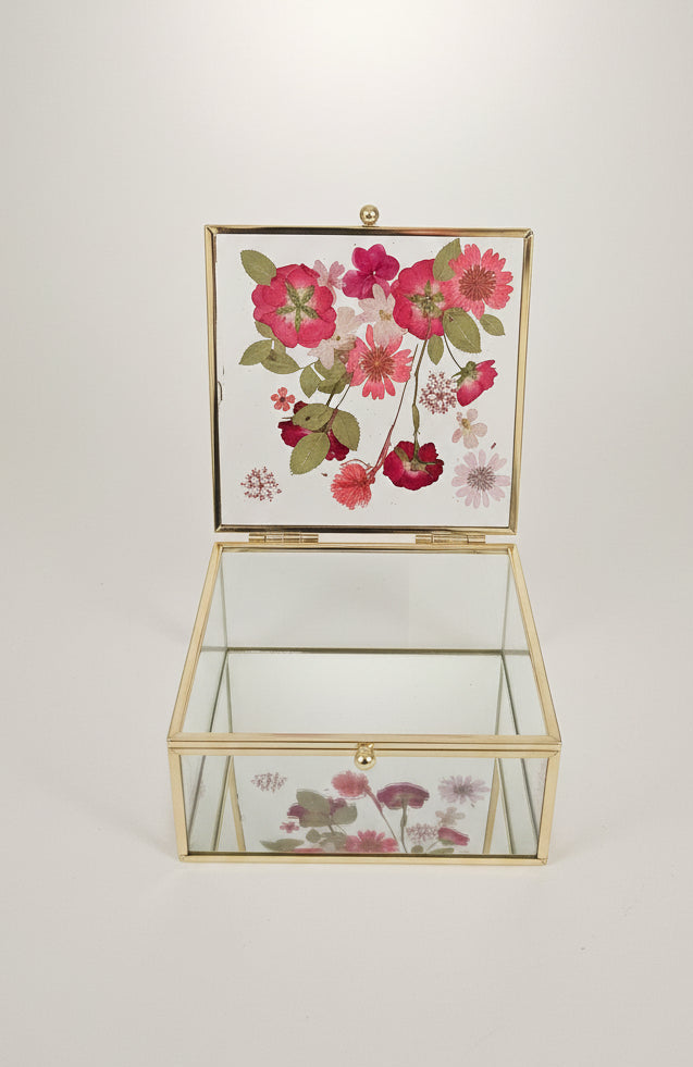 Floral mirrored keepsake and jewelry box with real pressed flowers. A 5" botanical glass box by artist Angel Singh, blending elegant storage with preserved floral art.