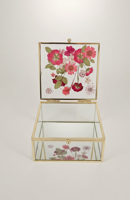 Floral mirrored keepsake and jewelry box with real pressed flowers. A 5" botanical glass box by artist Angel Singh, blending elegant storage with preserved floral art.