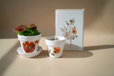 Mother’s Day gift set with live plant, floral terra cotta pot, soy coconut candle, and pressed flower card