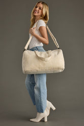 Travel in style with the Panache Cream Corduroy Duffel. Made from 100% cotton with a zip closure and interior pockets, it’s perfect for weekends and gym trips.