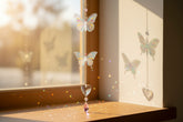 Handmade butterfly suncatchers with real pressed flowers and crystal chain. Reflects sunlight into rainbows—perfect for windows or near plants.