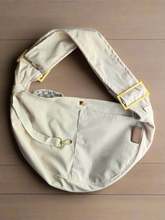 Pet Crossbody Sling and Carrier keeps you hands free while your pet stays secure. Adjustable strap, cozy design and safety clip for everyday adventures.