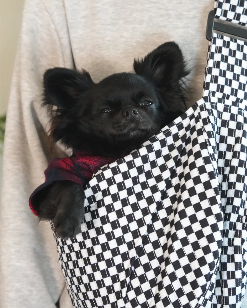 Pet Crossbody Sling and Carrier keeps you hands free while your pet stays secure. Adjustable strap, cozy design and safety clip for everyday adventures.