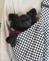 Pet Crossbody Sling and Carrier keeps you hands free while your pet stays secure. Adjustable strap, cozy design and safety clip for everyday adventures.