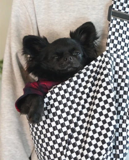 Pet Crossbody Sling and Carrier keeps you hands free while your pet stays secure. Adjustable strap, cozy design and safety clip for everyday adventures.
