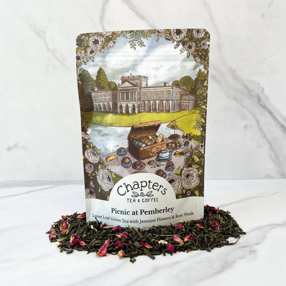 Elevate your tea ritual with our Picnic at Pemberley Jasmine Green Tea, inspired by Pride and Prejudice. This elegant blend of green tea, jasmine, and rose petals captures the romance of Austen&