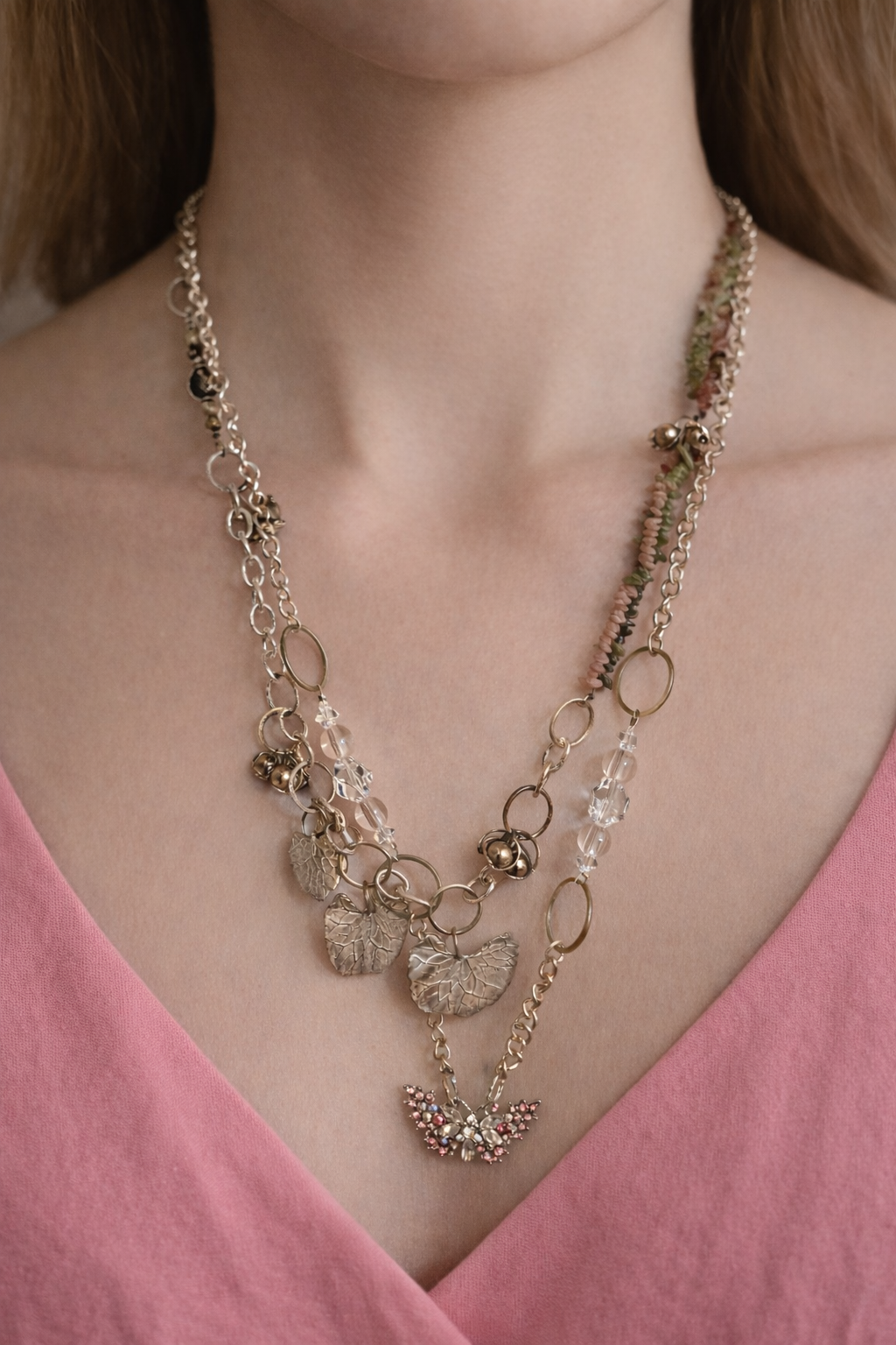 Pink Butterfly Curated Chaos Layered Charm Necklace handcrafted by artist KStonely with chains, ribbon, beads, and unique charms. One-of-a-kind mixed-media wearable art jewelry.