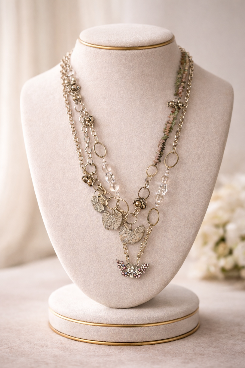 Pink Butterfly Curated Chaos Layered Charm Necklace handcrafted by artist KStonely with chains, ribbon, beads, and unique charms. One-of-a-kind mixed-media wearable art jewelry.