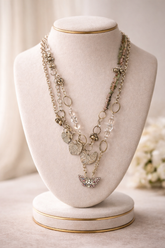 Pink Butterfly Curated Chaos Layered Charm Necklace handcrafted by artist KStonely with chains, ribbon, beads, and unique charms. One-of-a-kind mixed-media wearable art jewelry.