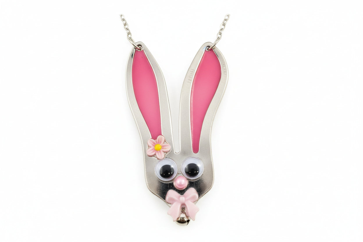 Whimsical fancy bunny pendant necklace handcrafted from vintage silverware, resin, and beads. One-of-a-kind Easter or everyday jewelry with vintage charm.