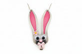 Whimsical fancy bunny pendant necklace handcrafted from vintage silverware, resin, and beads. One-of-a-kind Easter or everyday jewelry with vintage charm.