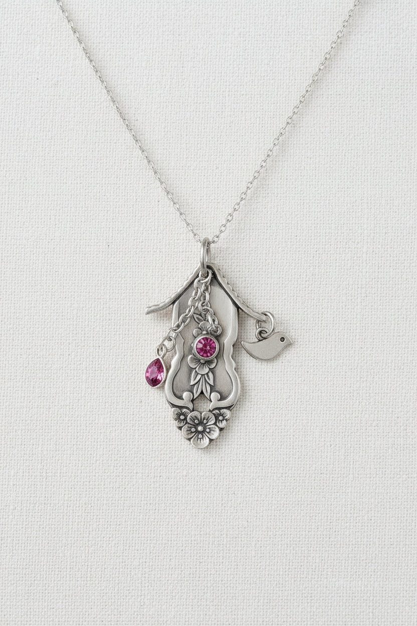 Cmade from vintage silverware. A whimsical, one-of-a-kind necklace perfect for nature lovers and vintage jewelry fans.