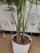 Handmade Copper Gemstone Tree with a copper wire trunk, wired branches, and tumbled gemstones on a rock base. Standing 7" tall, this unique, 10 lb. artisan-crafted piece symbolizes growth and beauty. Perfect as a meaningful gift or decor centerpiece, it adds natural elegance and timeless charm to any space.