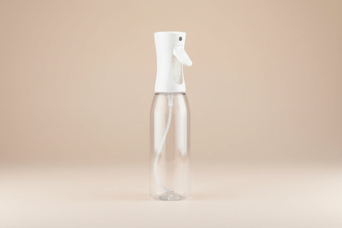 Plant mister spray bottle with ultra-fine mist for even hydration. A must-have plant care tool for houseplants, terrariums, and tropical plants.