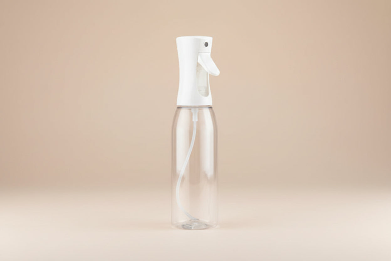Plant mister spray bottle with ultra-fine mist for even hydration. A must-have plant care tool for houseplants, terrariums, and tropical plants.
