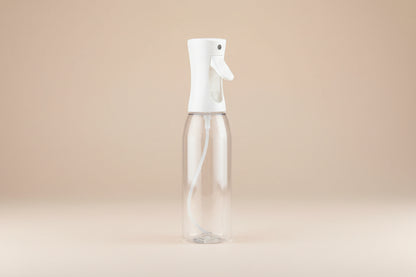 Plant mister spray bottle with ultra-fine mist for even hydration. A must-have plant care tool for houseplants, terrariums, and tropical plants.