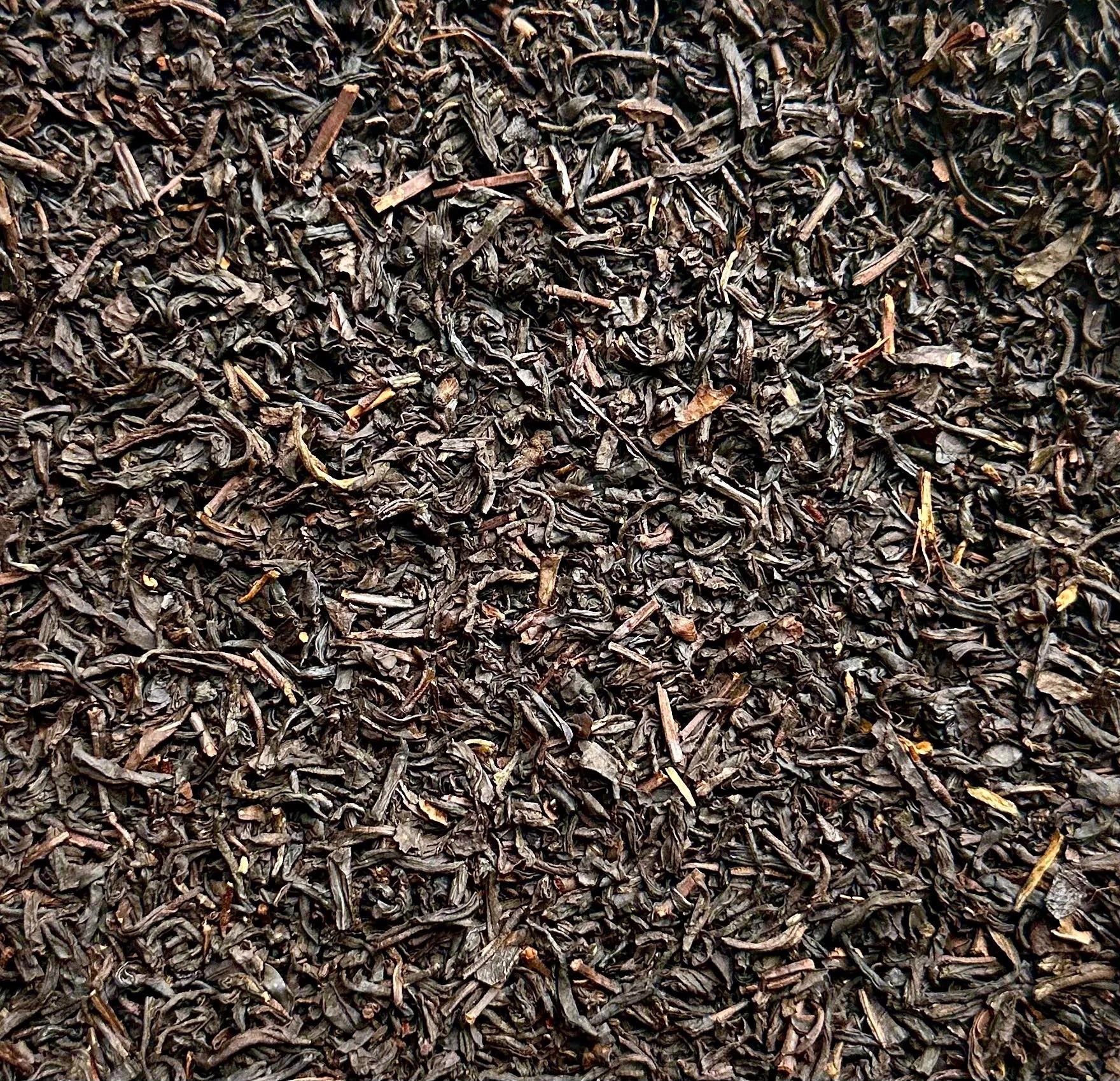 Indulge in Raspberry Truffle Black Tea with rich chocolate and sweet raspberry flavors. Premium loose leaf black tea, perfect hot or iced. 30–45 servings.
