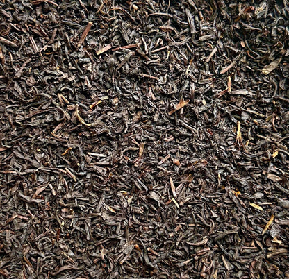 Indulge in Raspberry Truffle Black Tea with rich chocolate and sweet raspberry flavors. Premium loose leaf black tea, perfect hot or iced. 30–45 servings.