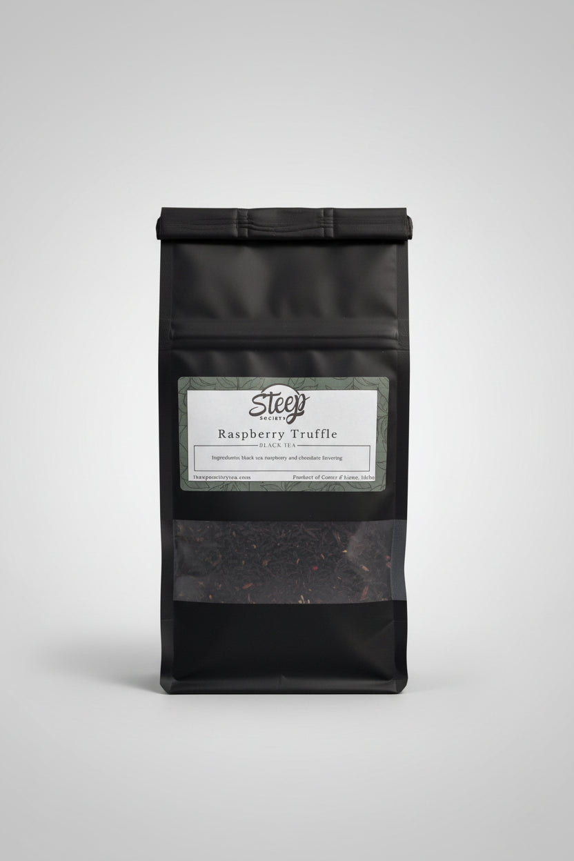 Indulge in Raspberry Truffle Black Tea with rich chocolate and sweet raspberry flavors. Premium loose leaf black tea, perfect hot or iced. 30–45 servings.