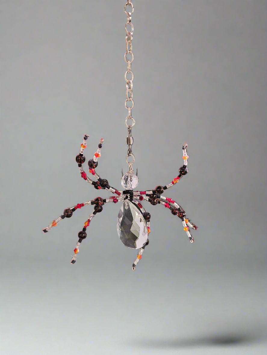 The Christmas Spider Ornament brings charm and tradition to your holiday decor. Inspired by the German legend of spiders weaving webs that Santa turned into shimmering tinsel, it symbolizes good luck and magic. Beautifully crafted, it’s a meaningful and unique addition to your tree or a thoughtful gift.