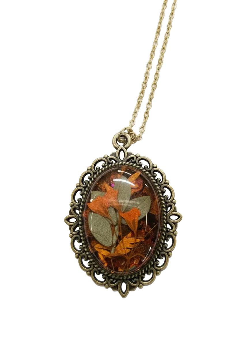 Forest Night Botanical Necklace with real preserved botanicals in resin. A moody, handcrafted nature-inspired keepsake for woodland lovers.