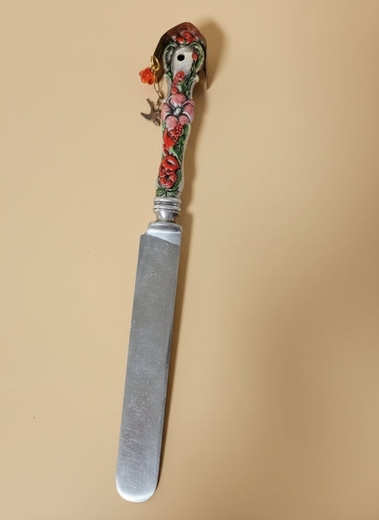 Handcrafted silverware birdhouse plant stake by KStonely. Upcycled, hand-painted, and beaded—whimsical cottagecore décor perfect for adding charm to any plant.